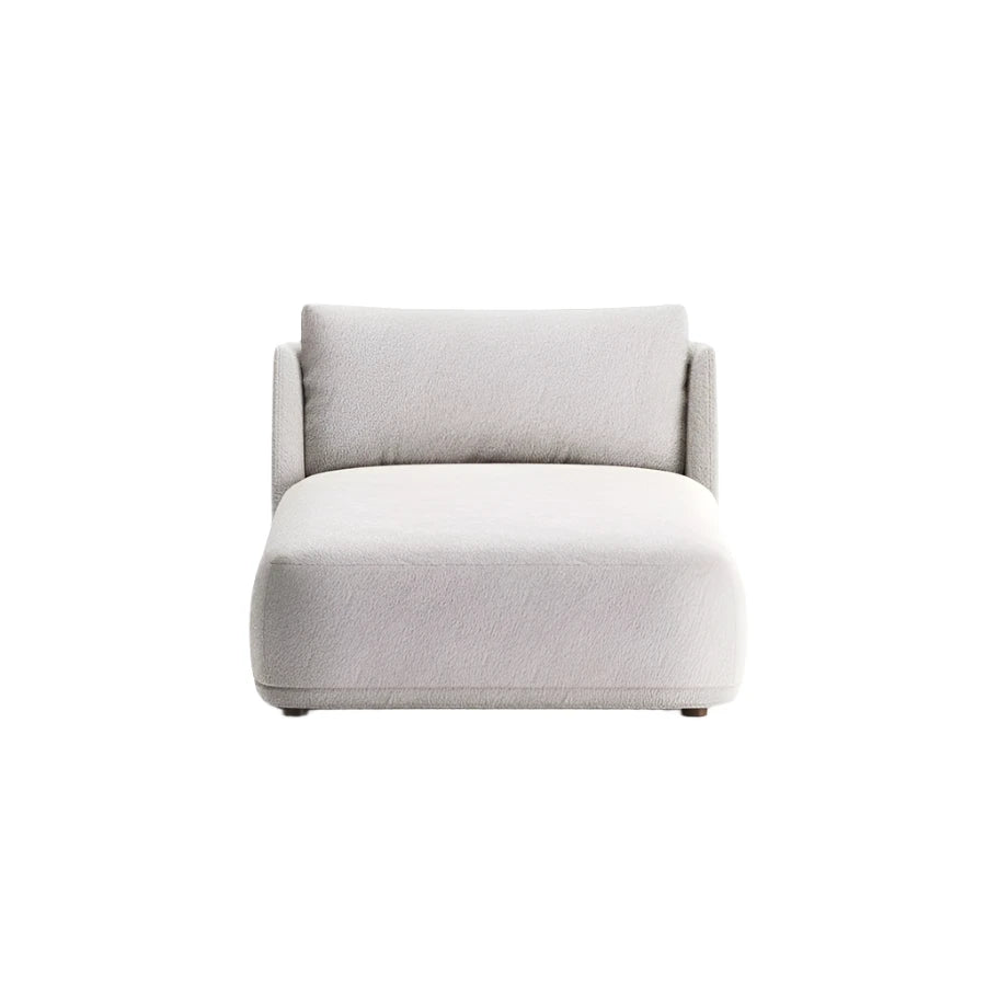 Agata daybed with sculpted seat and angled partial backrest
