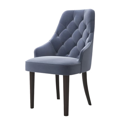 Upholstered dining seat in blue fabric with elegant tufting
