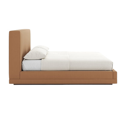Grace Bed with Tan Upholstered Headboard and Minimalist White Bedding